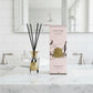 Côte Noire diffuser with reeds and packaging on a white background