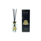 Côte Noire diffuser with black reeds and gold accents on a white background