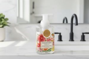 Foaming hand soap bottle with floral design and Michel Design Works logo on a white background
