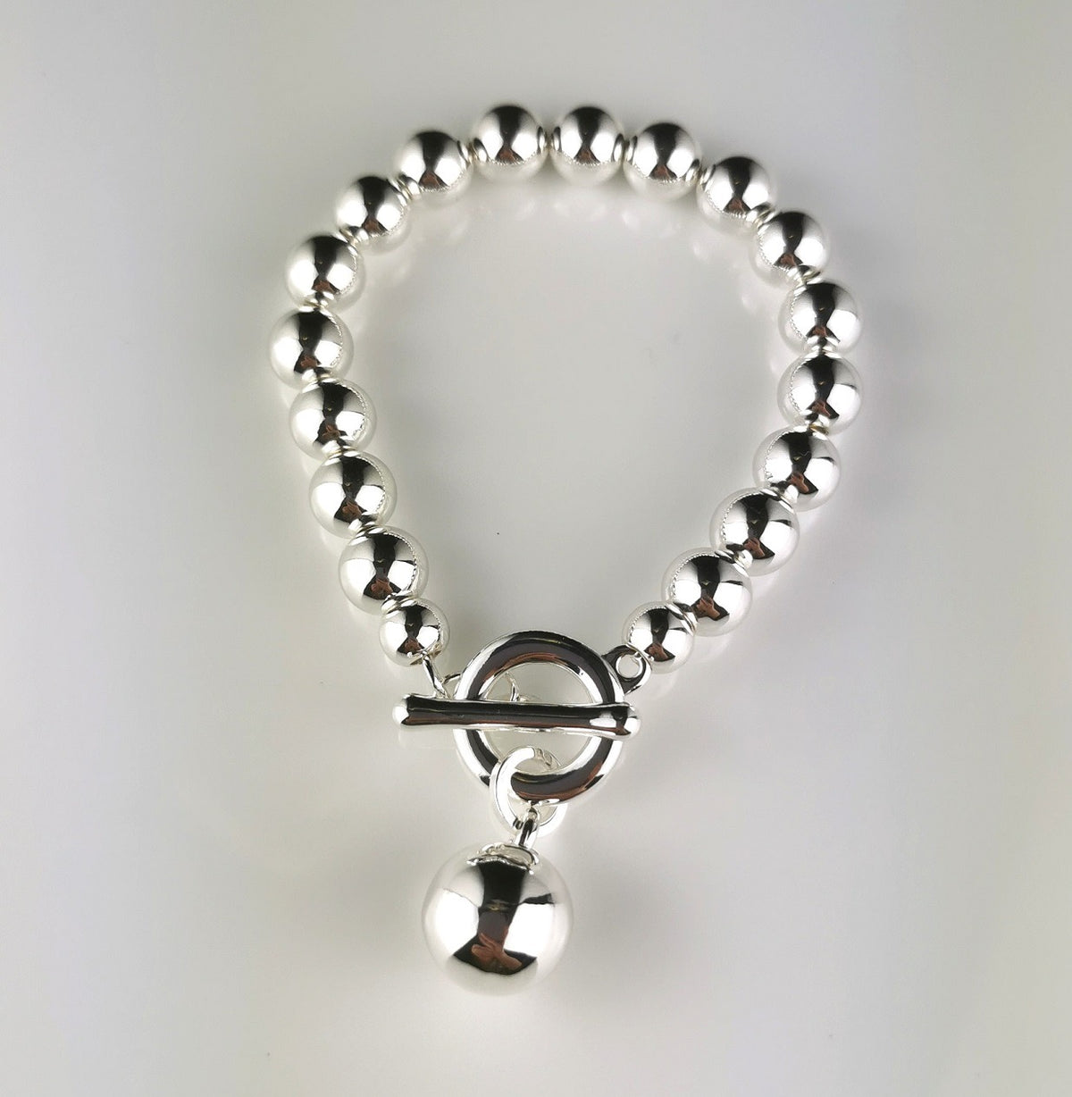 Silver Bracelet with Ball Fob