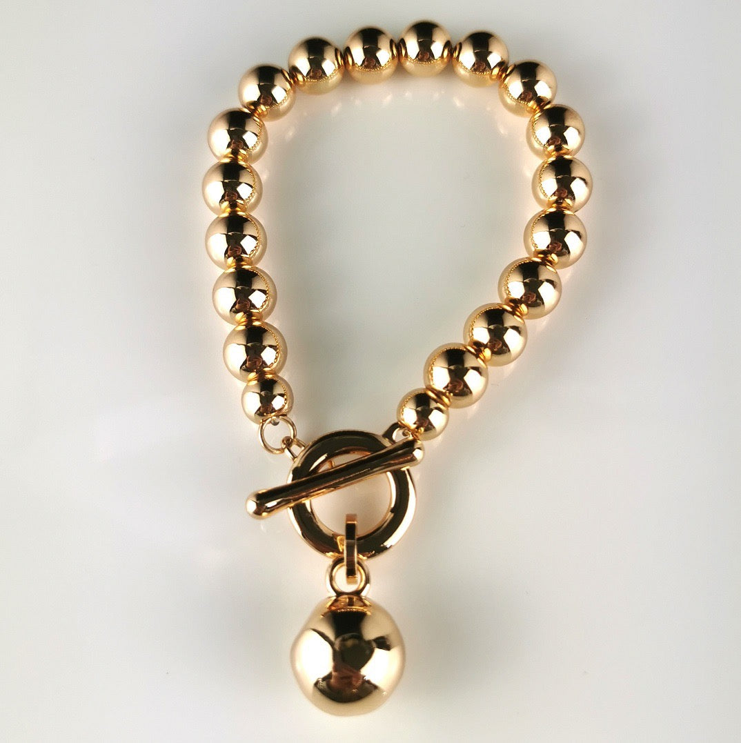 Gold Bracelet with Ball Fob