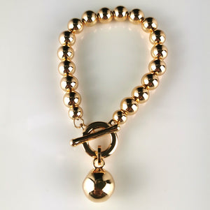 Gold Bracelet with Ball Fob