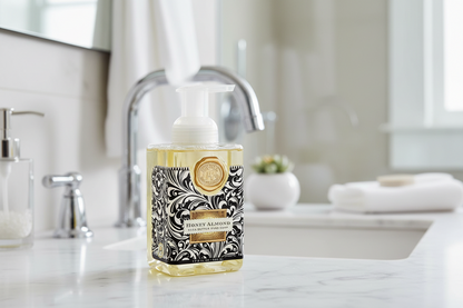 Foaming hand soap bottle with decorative label on a white background