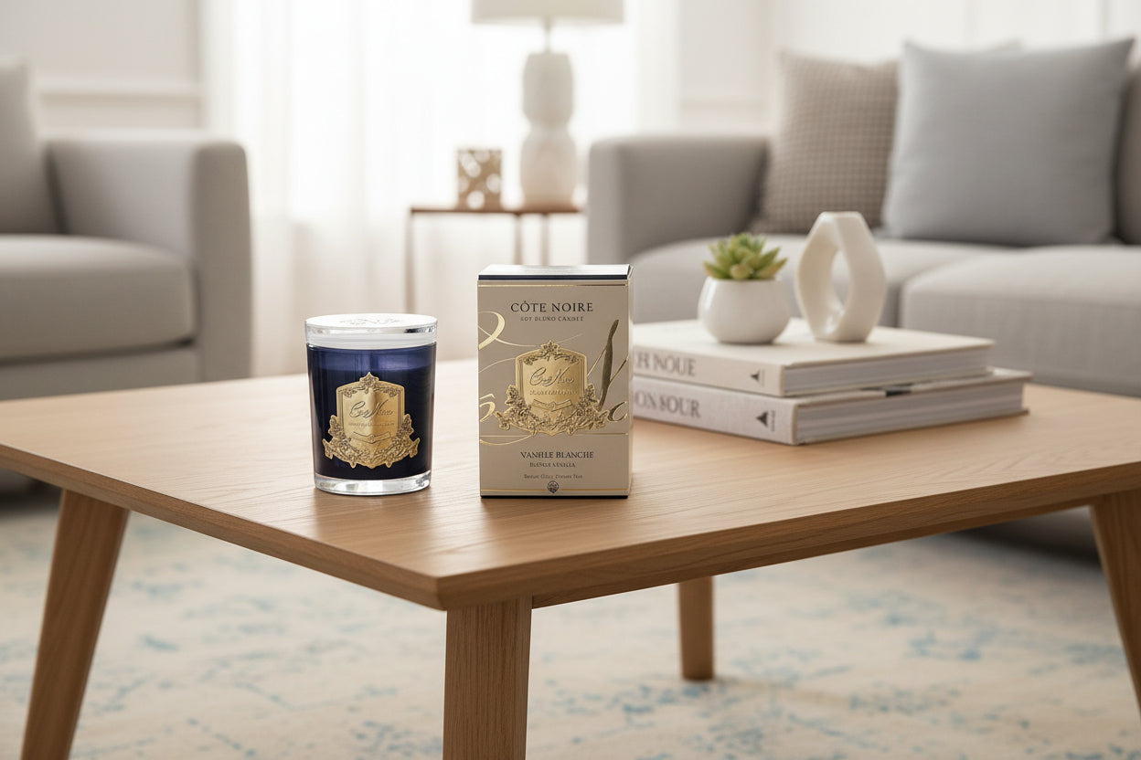 Cote Noire candle and packaging on a white background