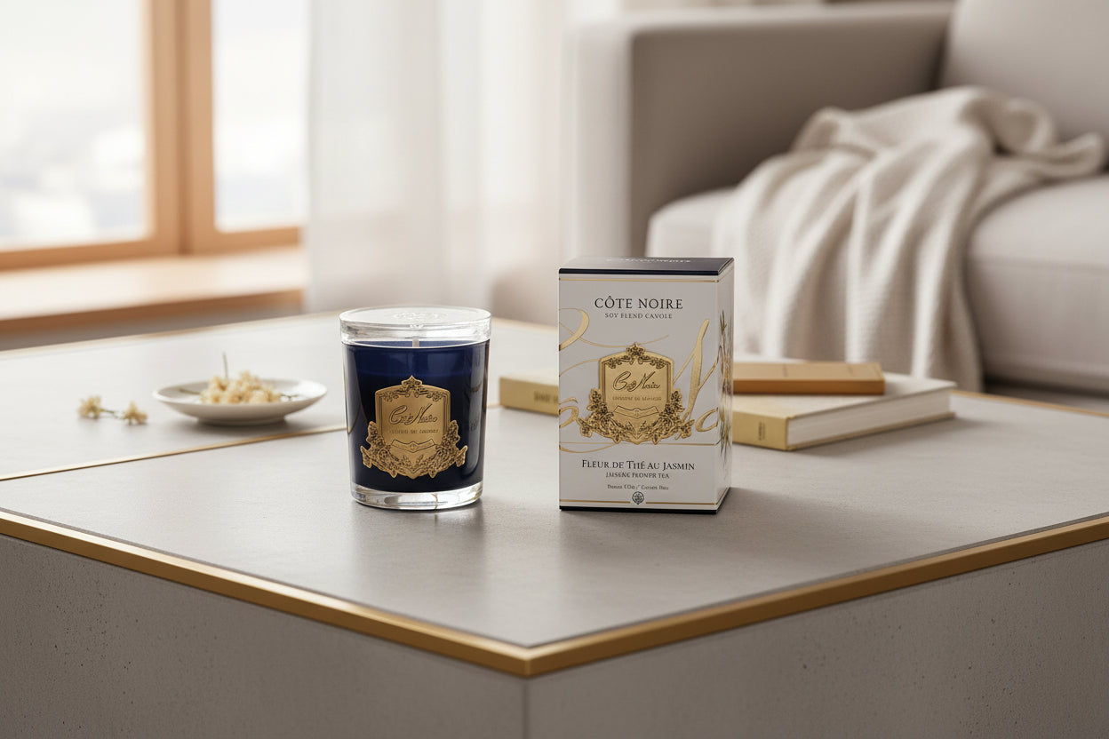 Cote Noire candle and packaging on a white background