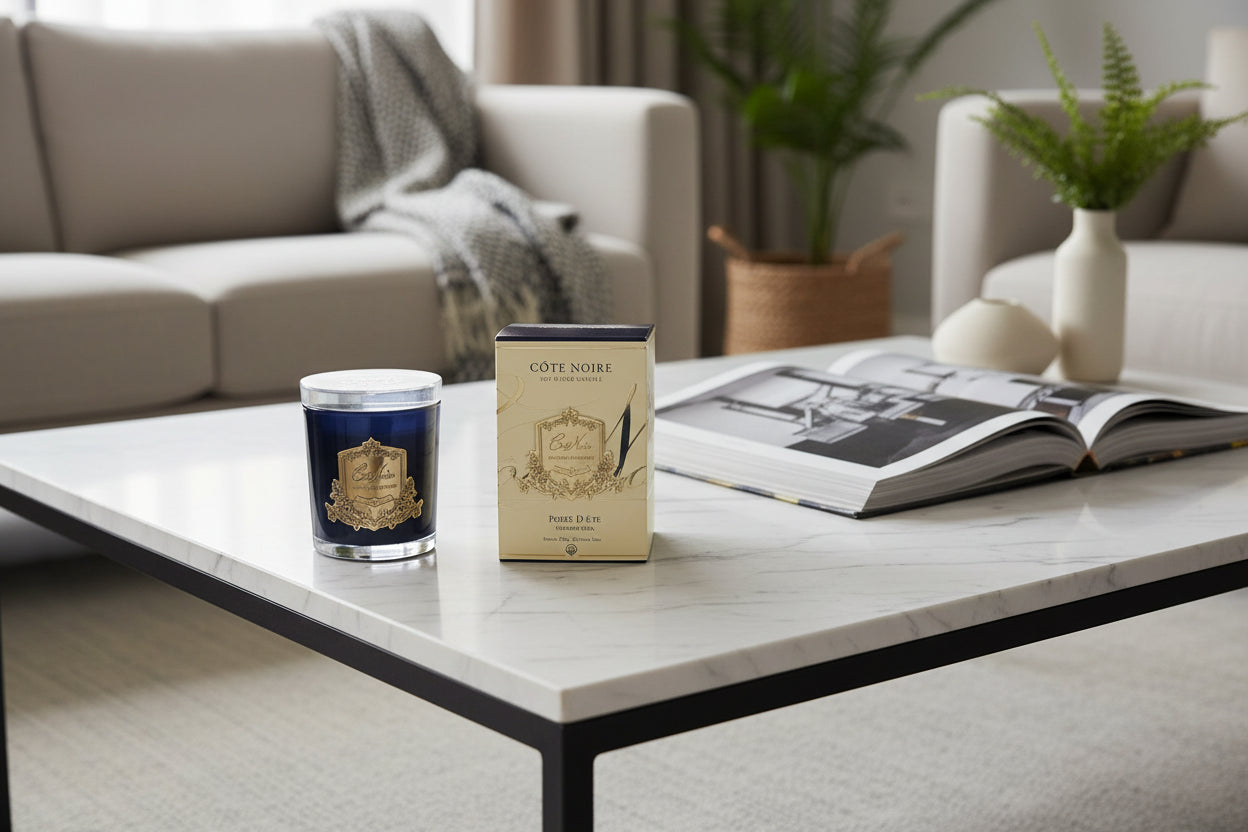 Cote Noire candle and packaging on a white background